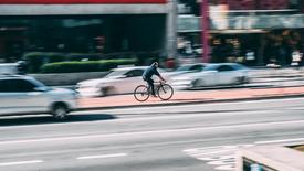 Web designer choosing between blur and virtual backgrounds