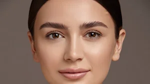 Portrait showing natural skin texture with subtle professional retouching