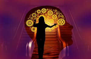 Creative designer working on engaging social media graphics with multiple platform layouts, colorful design elements, and engagement analytics displayed on computer screens