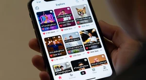 TikTok viral content discovery For You Page on smartphone showing trending content and hashtag exploration interface