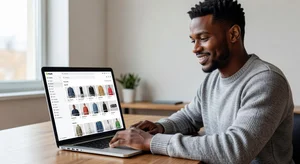 A Shopify seller reviewing their store's product gallery on a laptop, showing consistently watermarked product images across all categories, representing a professional and protected product photo library