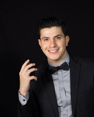 Professional woman working on personal branding strategy with visual identity elements, color palettes, and brand materials on modern desk