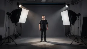 Professional photography studio with AI-controlled lighting and dramatic shadows