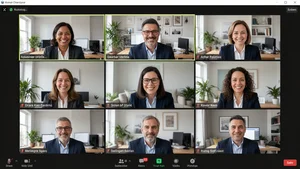 Video conference call showing remote team members in various home office settings